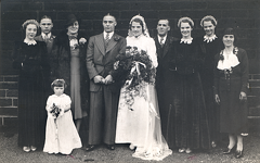 2017-01-14-14-29-03-00 -- Marriage of Robert Bellamy 1917-Deceased and Beatrice Ethel Kay 1917-, 1938, Sheffield
Left to Right: Mother, Edwin Bellamy, Emily Bellamy, Robert Bellamy, Beatrice Ethel Kay, Ethel's father, Marjorie Ellis, Irene Kay, Aunt Hilda (Sister of Ethel's father)
Front Left: Brenda Bellamy